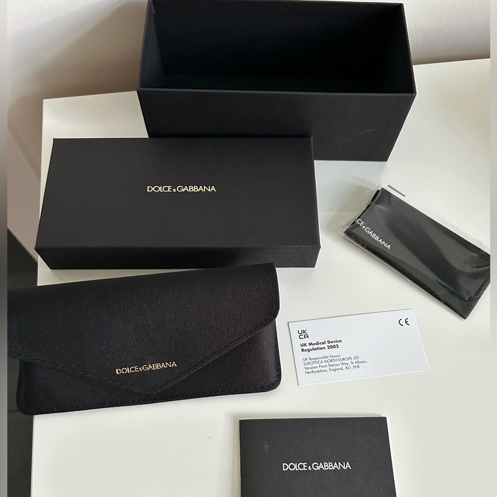 Authentic Dolce & Gabbana box, case, certificate and cloth.  No sunglasses